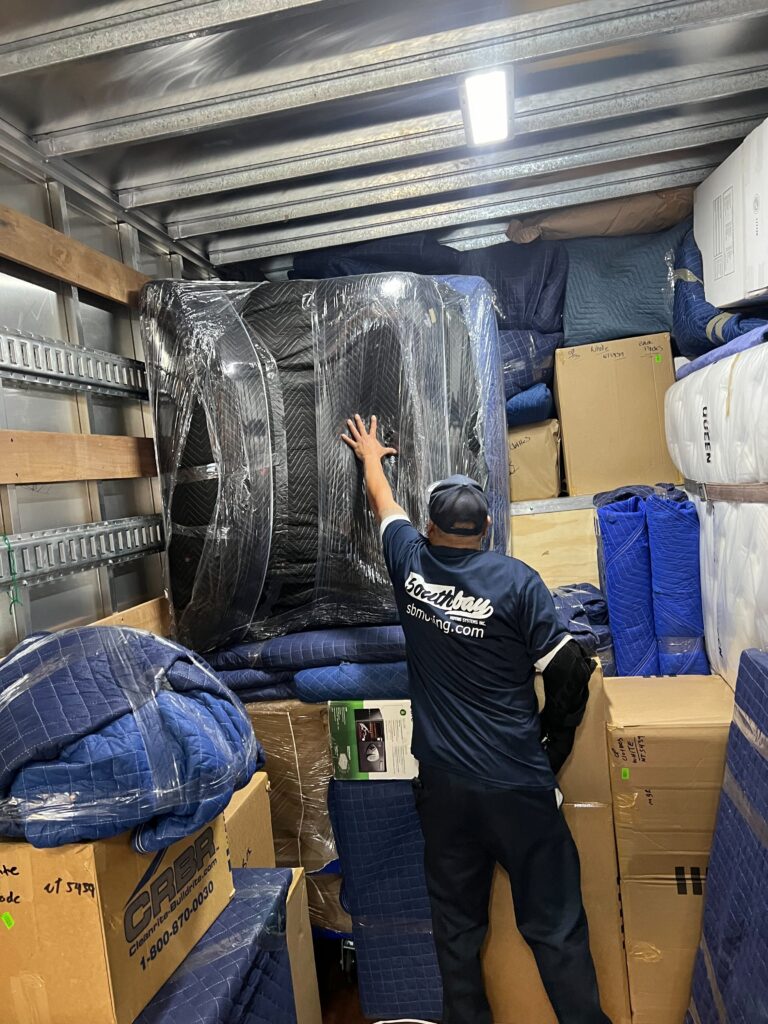 Southbay moving team packing up a truck for a long distance move from California to Texas