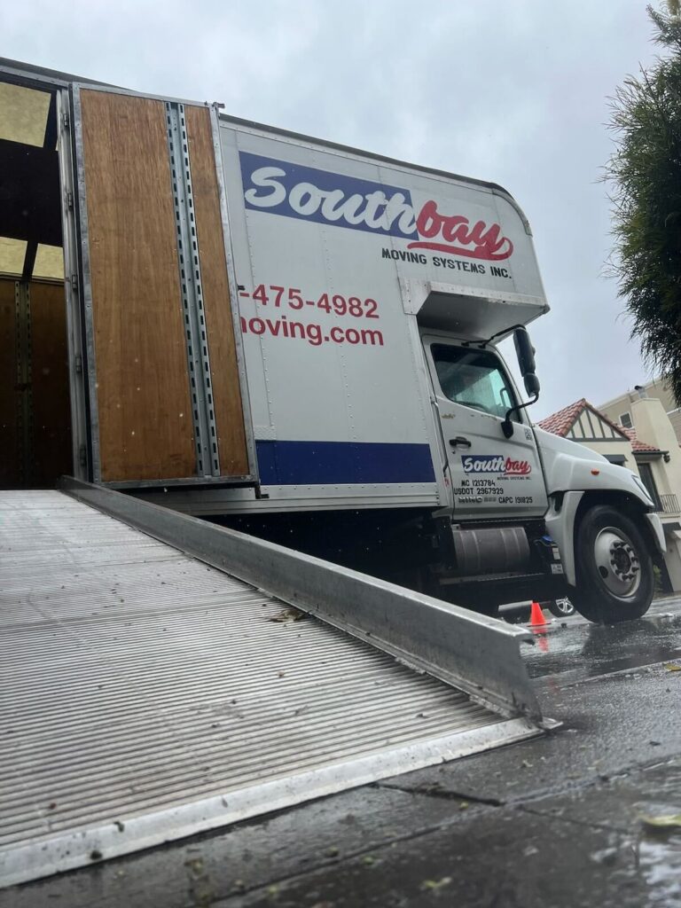 Southbay moving truck unloading a truck after a long distance move